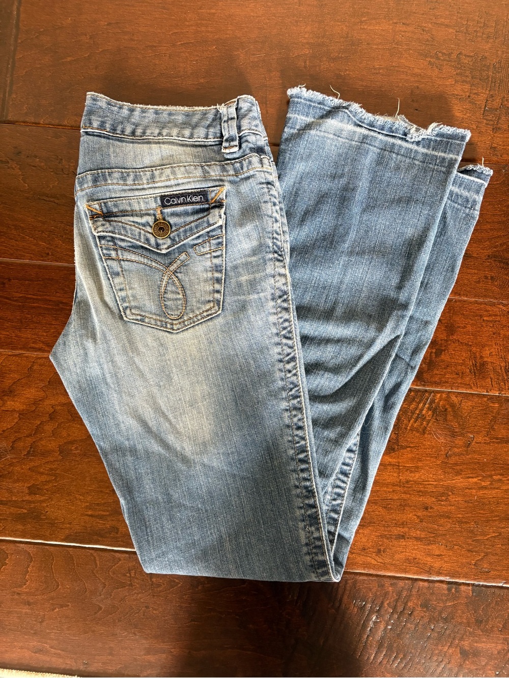 Calvin Klein Women's Light Blue Bootcut Jeans with Frayed Hem